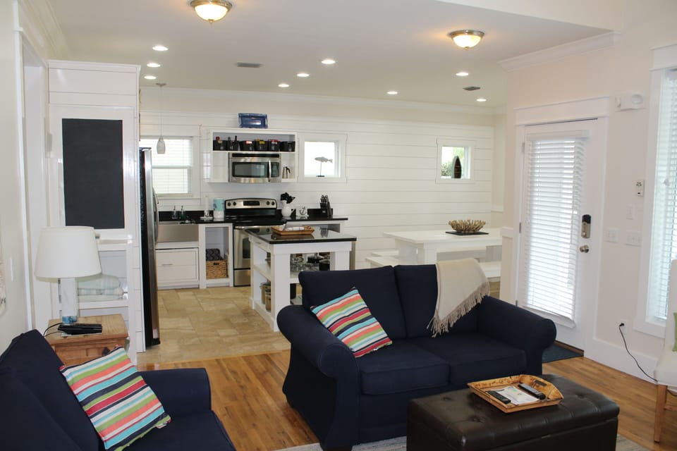 Open-concept family room, kitchen and dining are light and bright