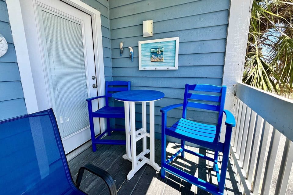 Seating options for hanging out on the private balcony.