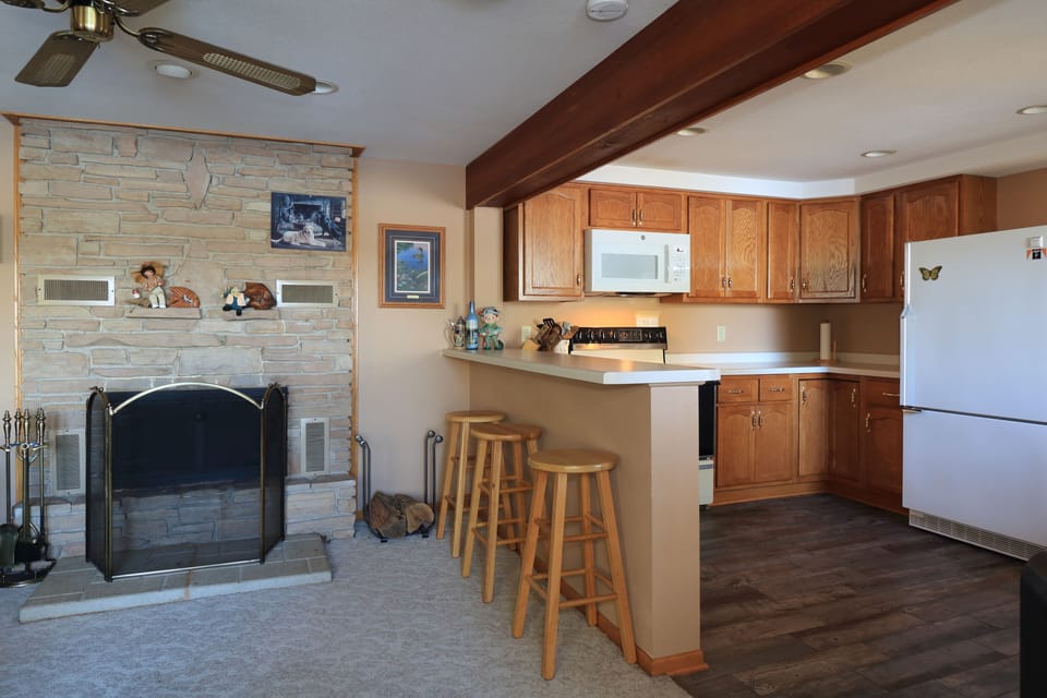 Kitchen (Right Side) Living Room Fireplace (Left Side)