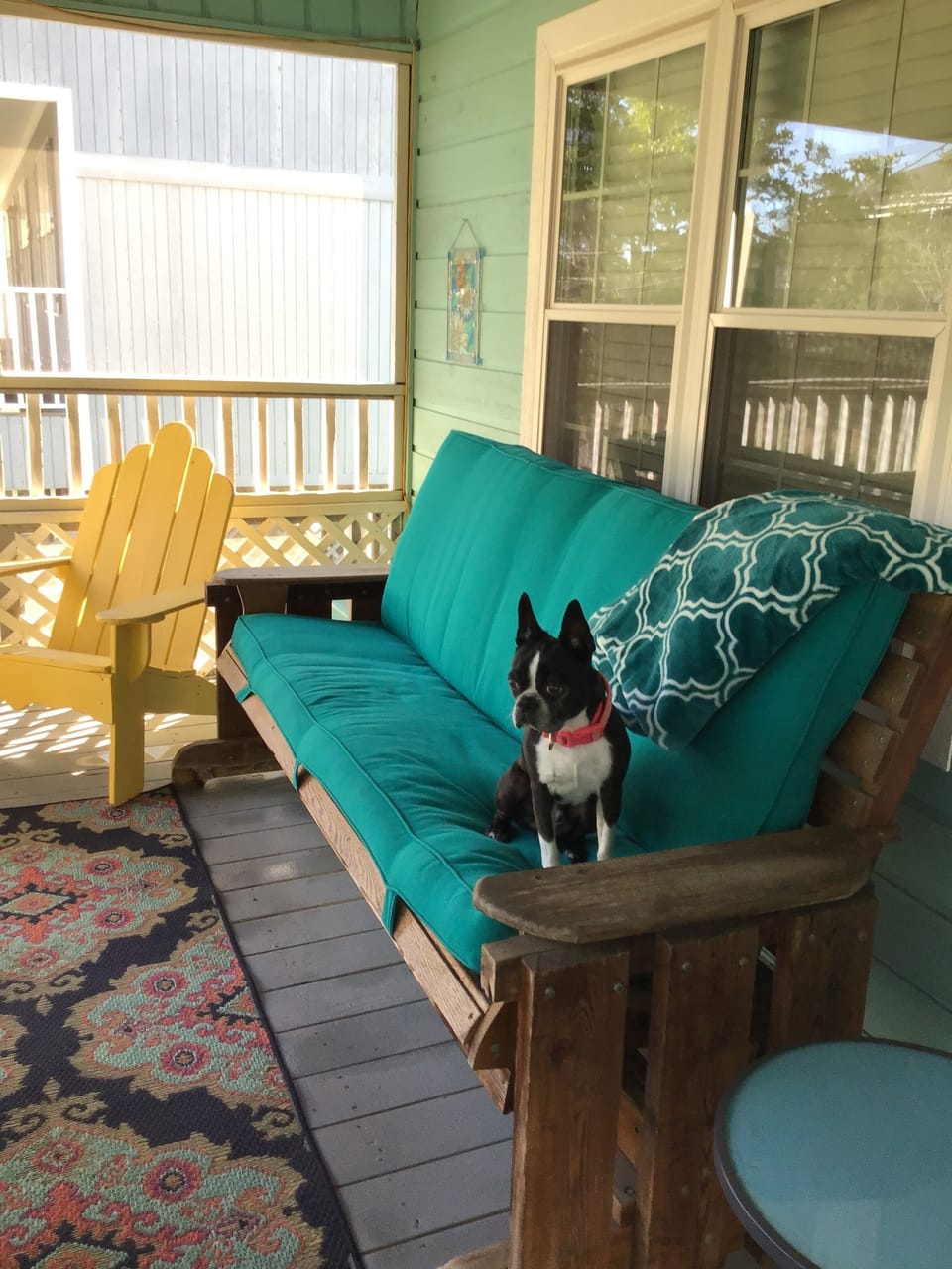 Pets and their humans love the screened front porch for relaxing .