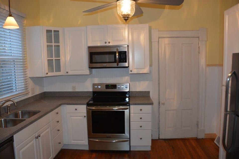 Lower unit kitchen provides comfortable space to prepare family meals.
