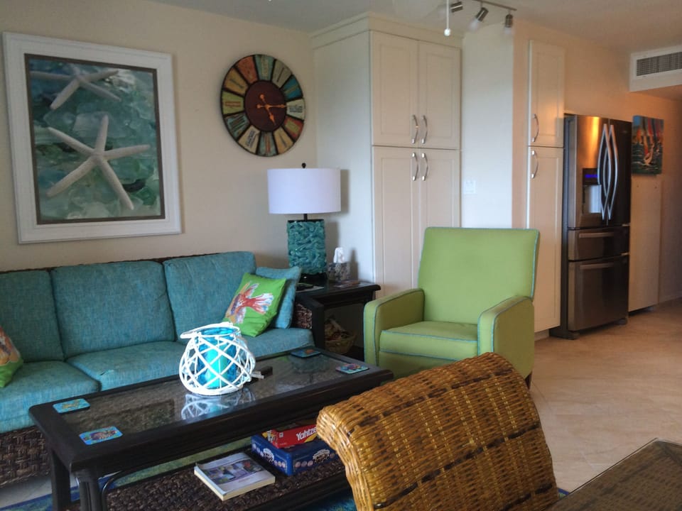 Main floor living area with queen sofa-sleeper and recliner
