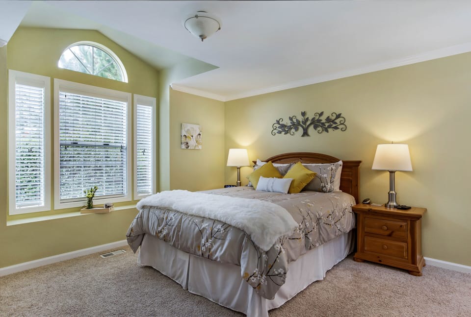 Our master bedroom features a new queen mattress with an electric heating pad.