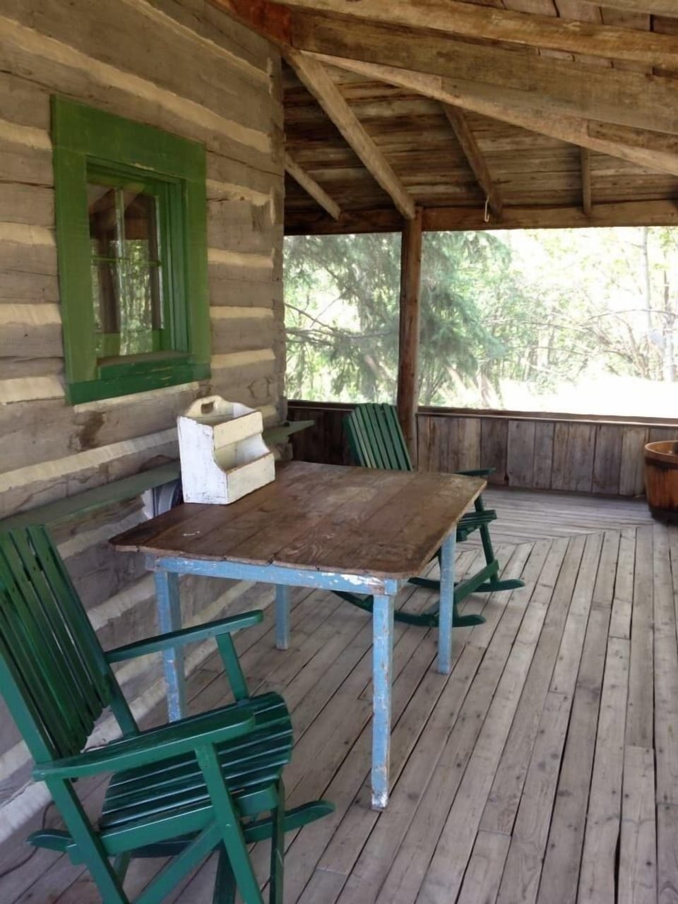 Two screened porches are bug-free places to relax and enjoy a meal.