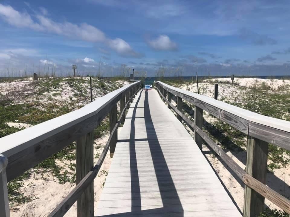 Private path to beach with shower. 