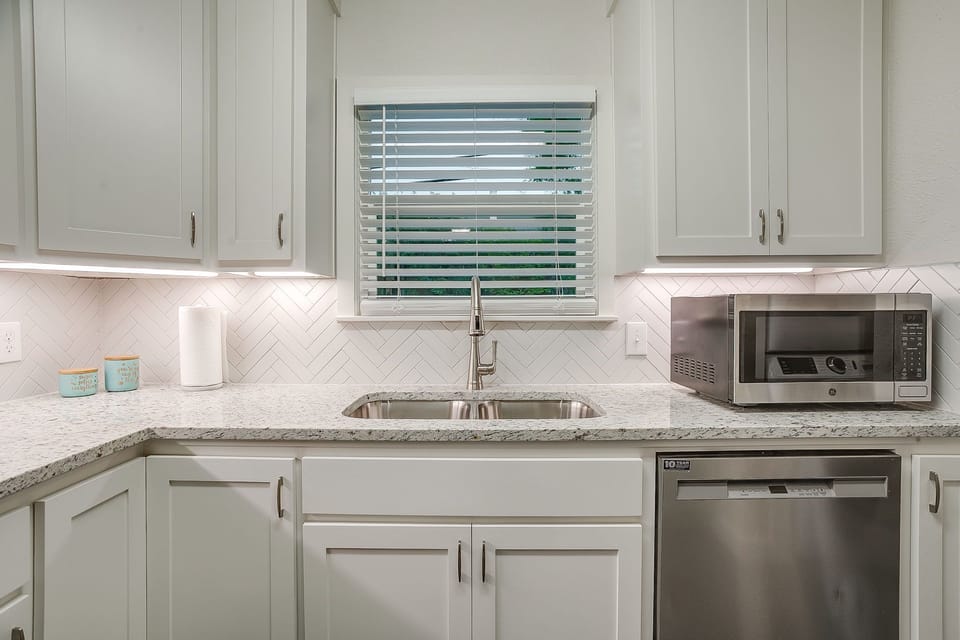 Kitchen with microwave and dishwasher