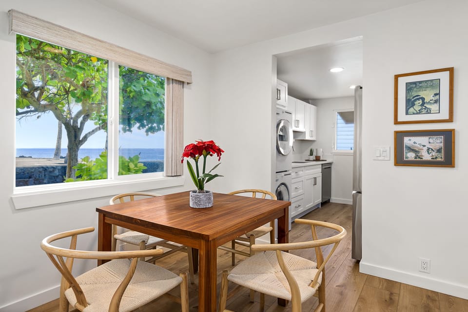 Dining table  with seating for 4.  Side window with gorgeous views/ventilation. 