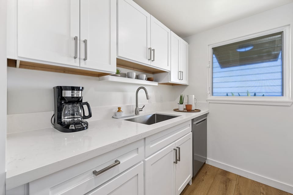 Brand New kitchen with shaker cabinets and quartz countertops.  New Appliances. 