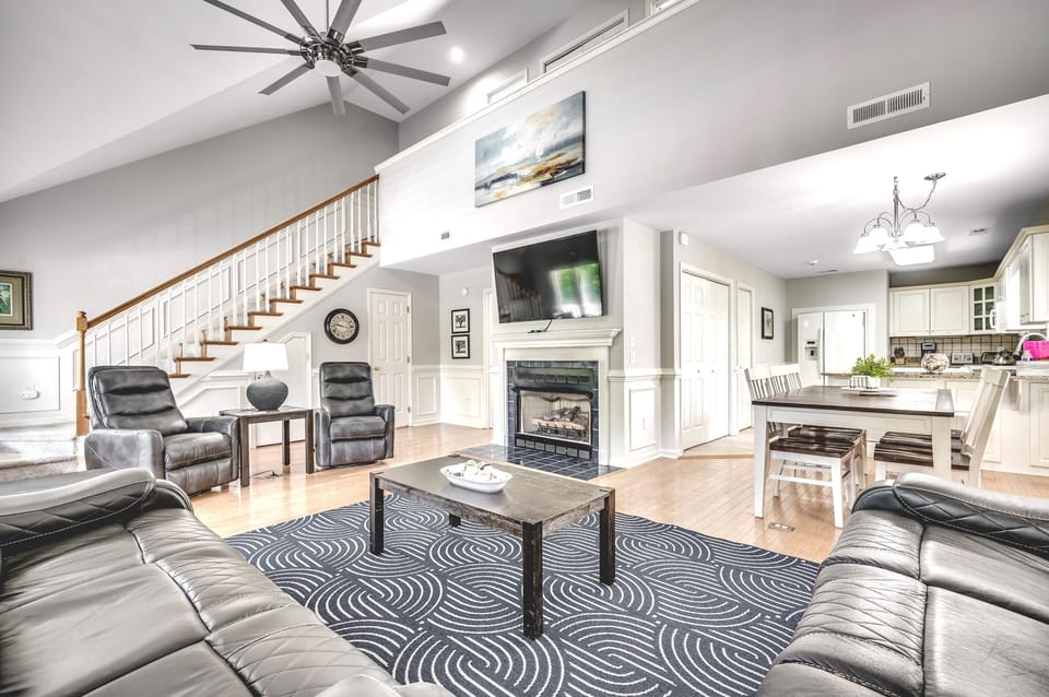Living Room - 2 Recliners, 2 Sofas, Gas Log Fireplace, & Large Screen Smart TV