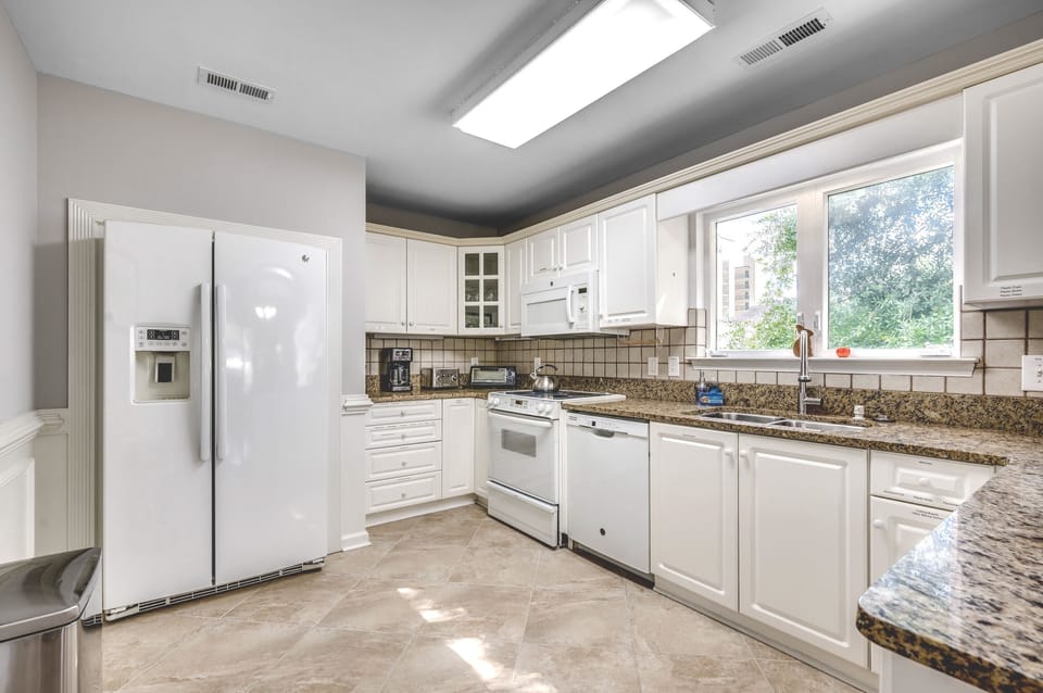 Bright Open Large Kitchen, Electric Range & Oven, Dishwasher, and Microwave