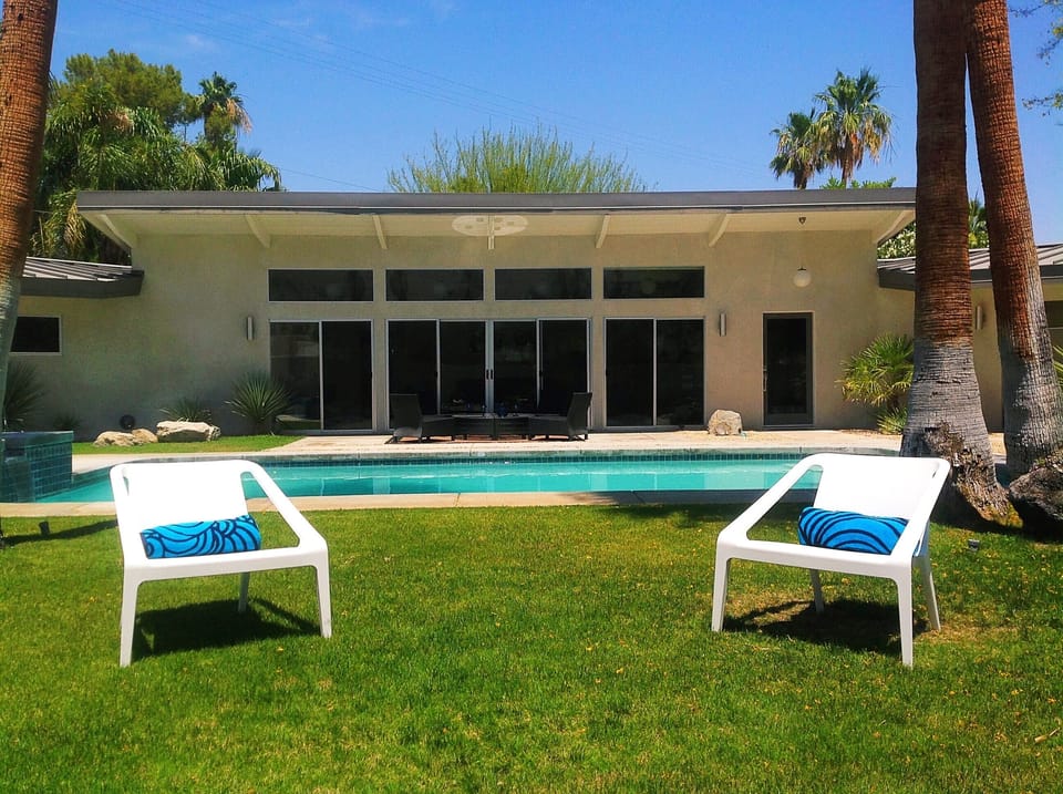 Your pool and outdoor space with a backdrop of mid century modern design