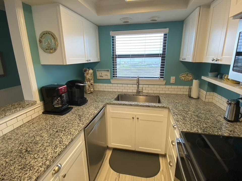 View of Santa Rosa Sound through kitchen window over large single sink