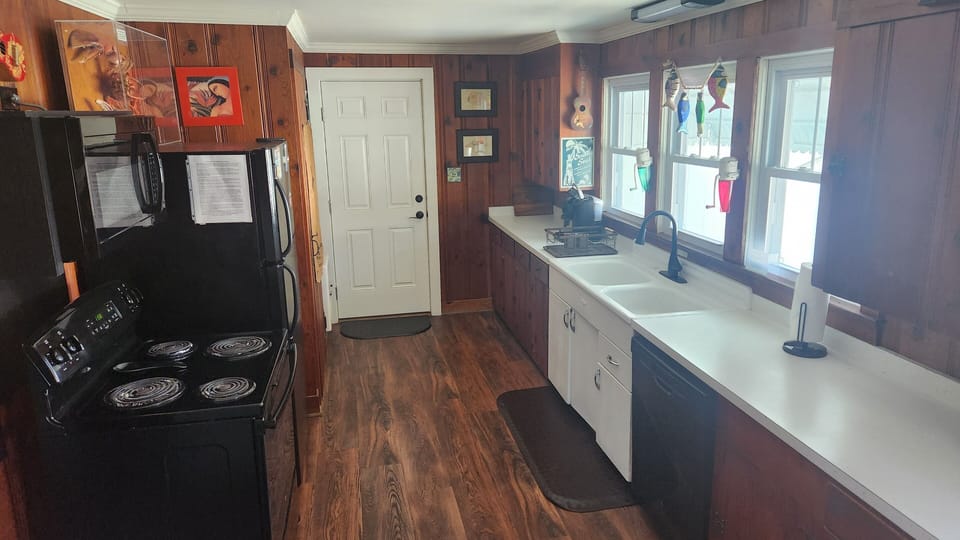 Enjoy preparing meals in our kitchen (with original cabinets & porcelain sink)!