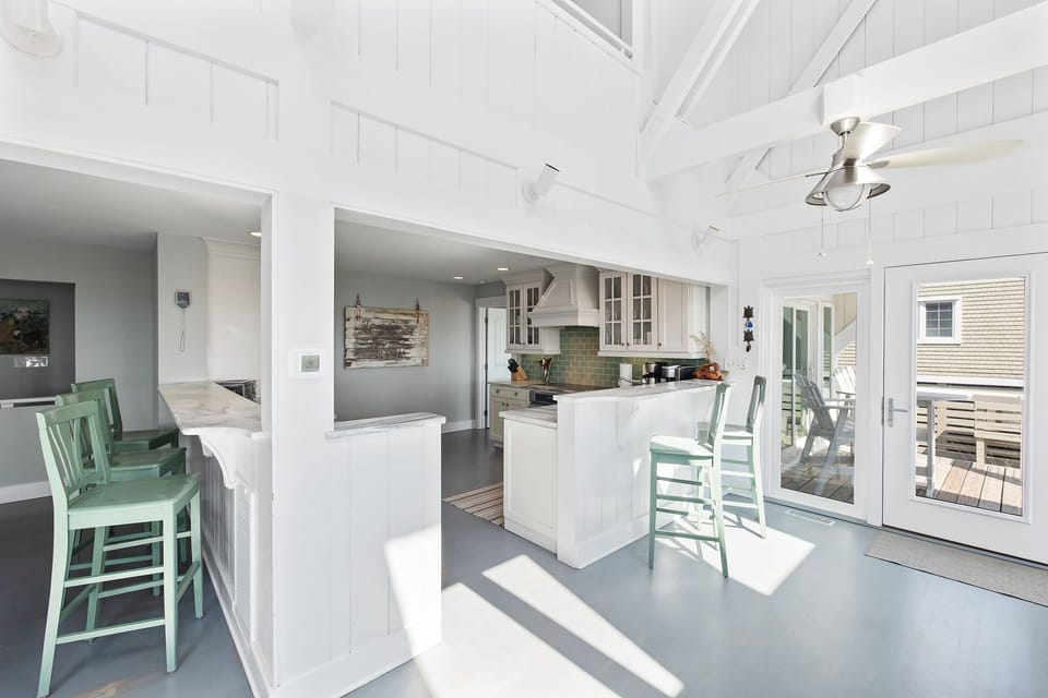 Breakfast bars on two sides of kitchen