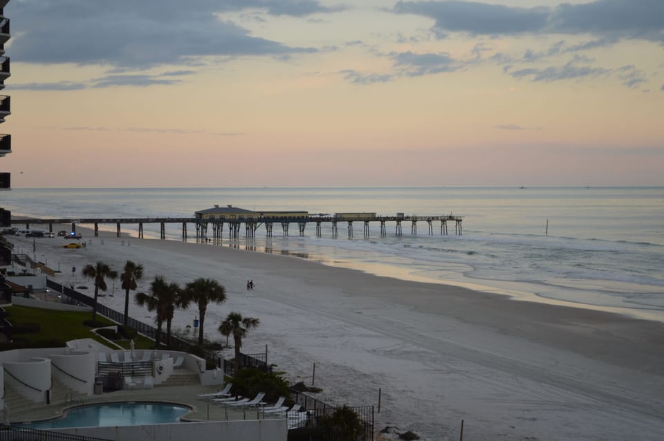 View from balcony looking towards Crabby Joe's Sundeck Pier; GREAT FOOD!