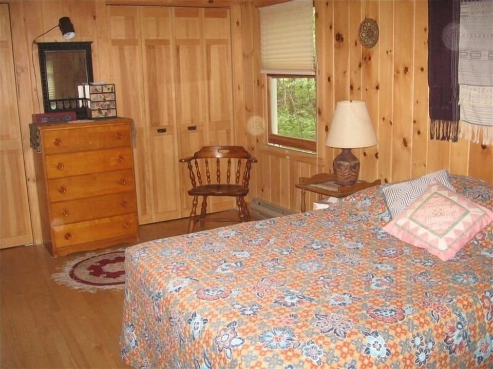 Master bedroom with queen bed and  single bed, spacious closets, and full bath.