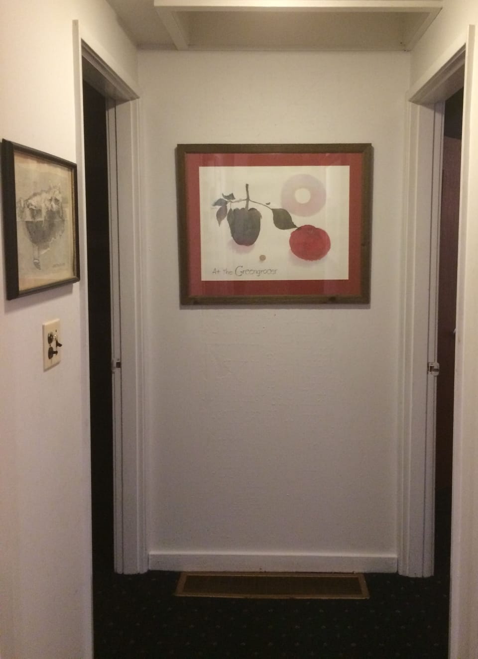 The hall leading to the bed and bathrooms. Art purchased locally in the valley.