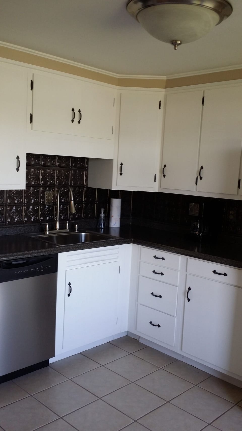 Kitchenette on the Lower Level has a Refrigerator, Oven and Dishwasher.