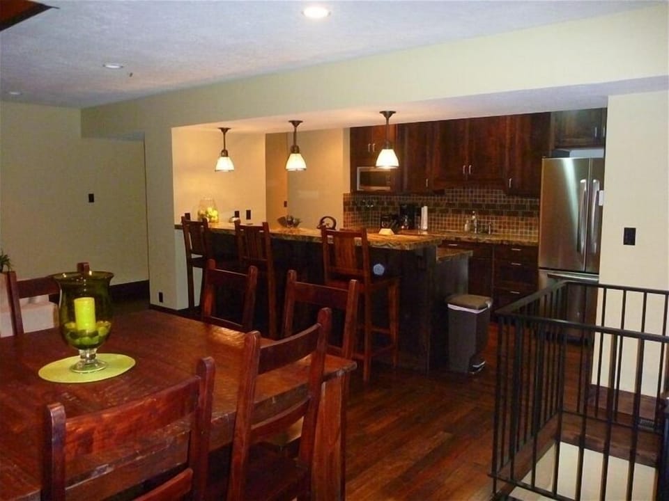 Open dining and kitchen combined with the living room