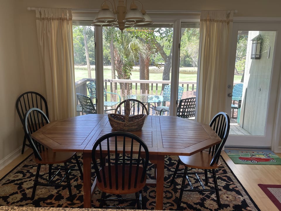 New dining room chairs and very soft carpeting! Golf course out the window~
