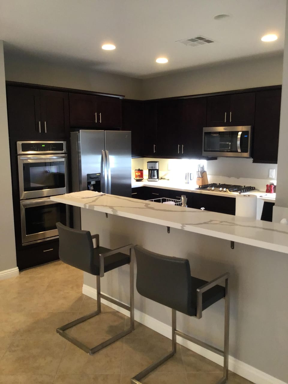 Cooking is fun in this fully equipped, elegant kitchen. 
