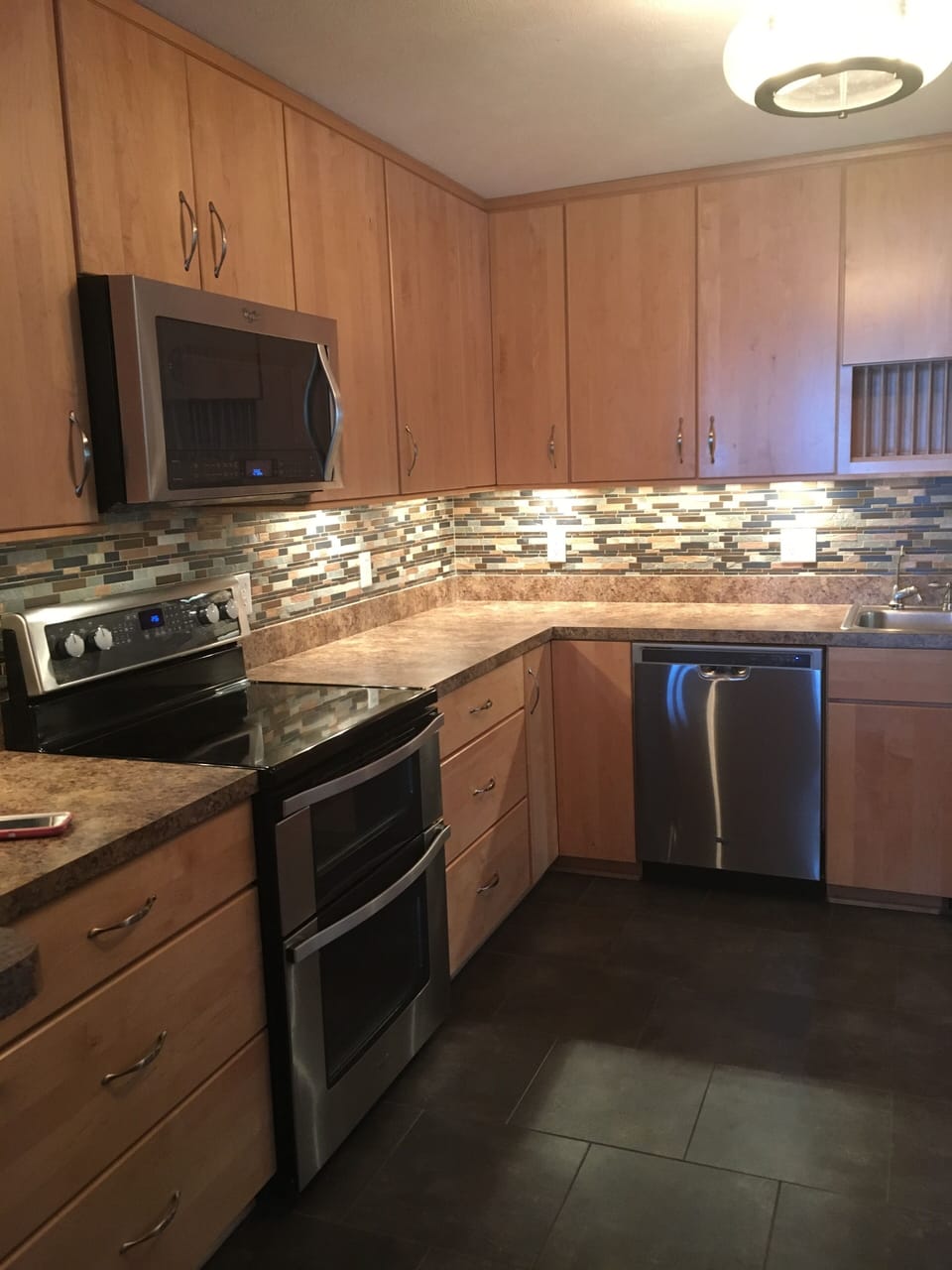 Kitchen has plenty of counter space, dishwasher, double oven & 2 refrigerators
