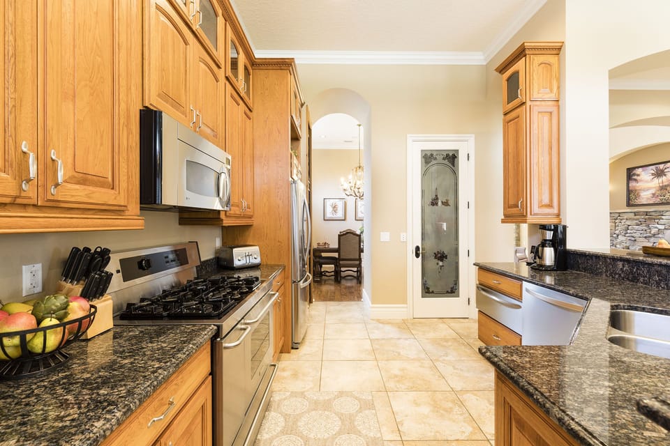Kitchen & separate Food Pantry, well stocked kitchenware