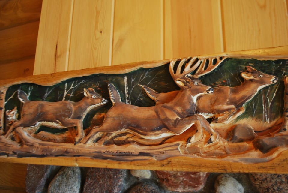 LOG HOME First floor BEDROOM #1:  Can you believe the carving detail?!