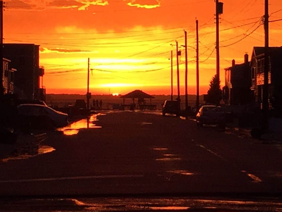 Sunset at the end of our street after a storm