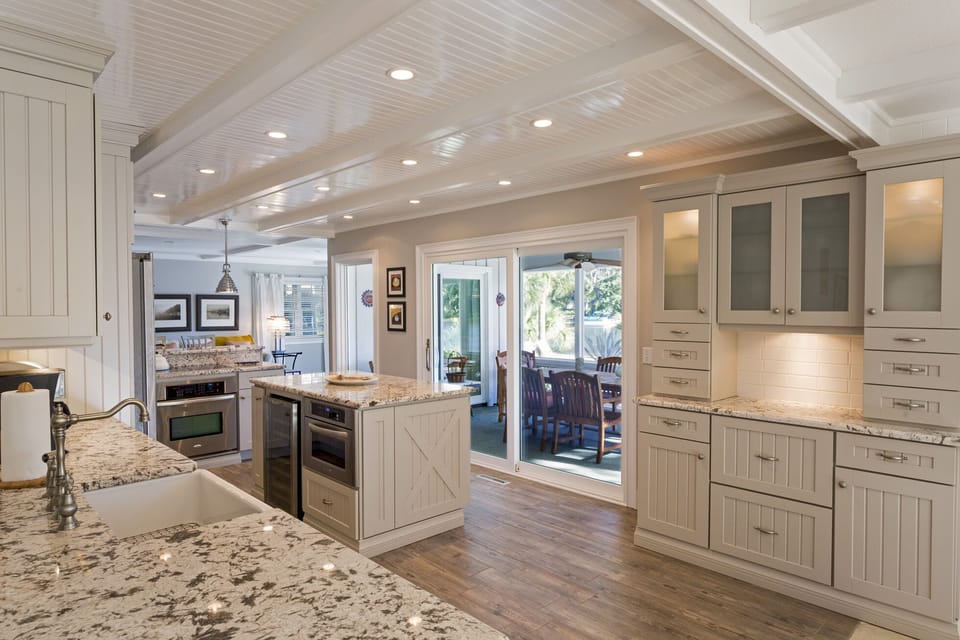All new cabinets w plenty of storage. Matching white china and serving pieces. 