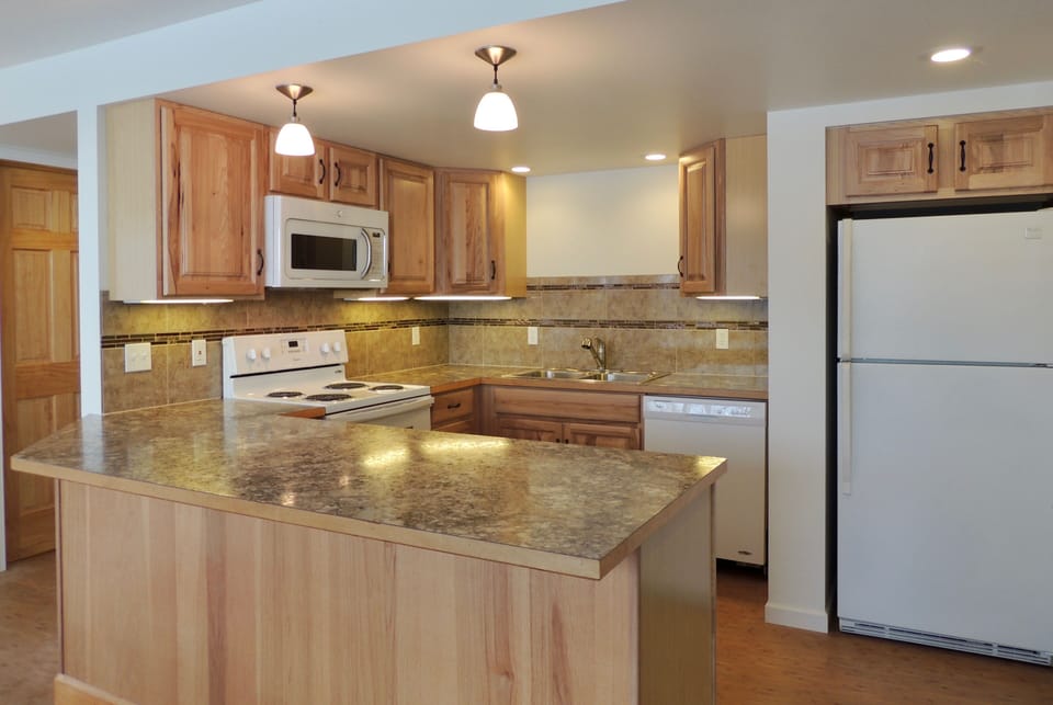 One of your 2 full kitchens, with all pantry ingredients supplied for you!