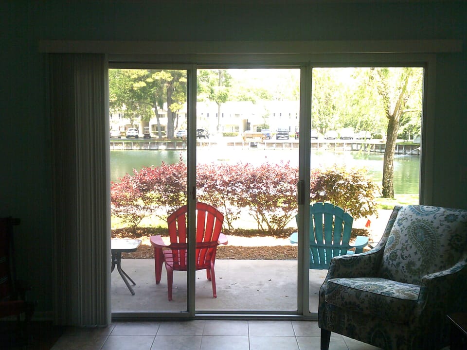View of the patio & pond from the living room