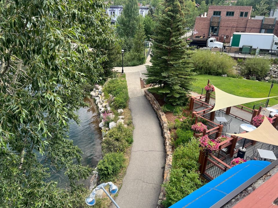 picture from deck.. Main St is end of path... amazing location!!!!