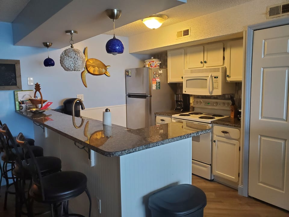 Kitchen updated with granite counters.