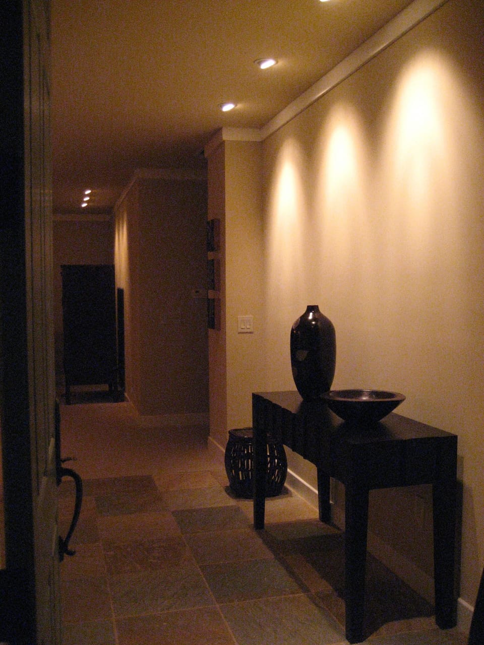 Evening shot of entryway with intimate lighting.