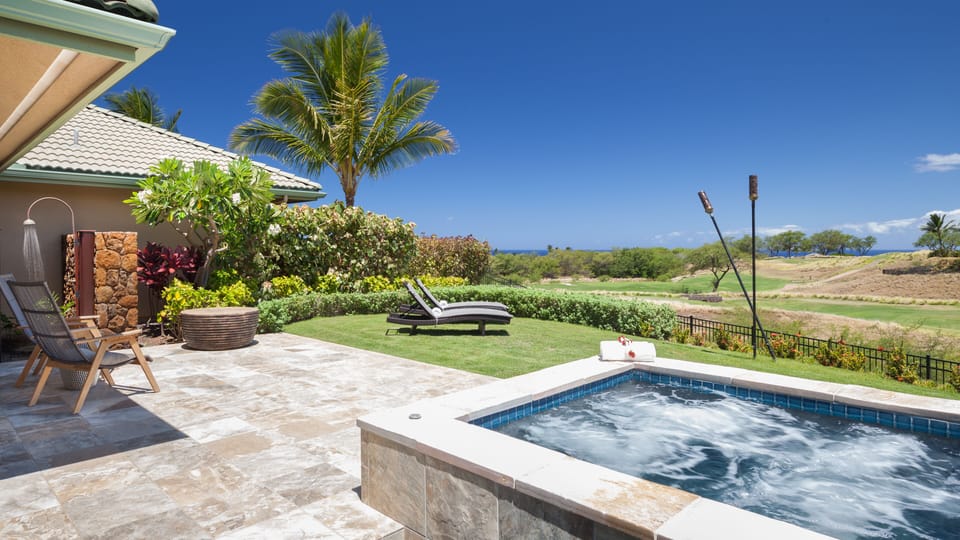 Soak in the private spa at the end of a busy day