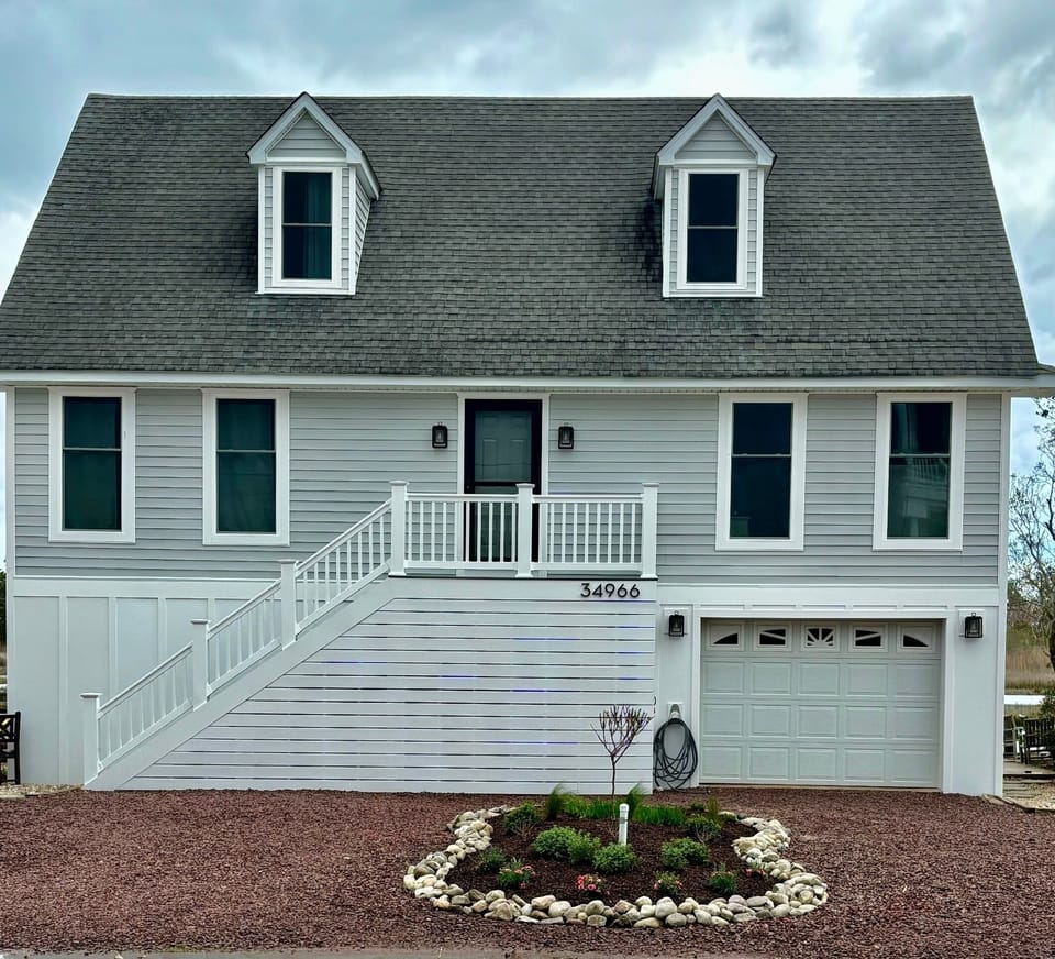 Brand new Windows, siding, entrance and garden. 3 parking spaces.