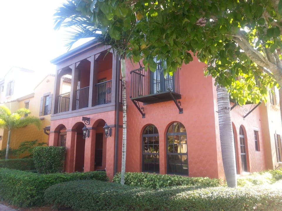 A Bright corner 1st floor Condo with a front porch for relaxing