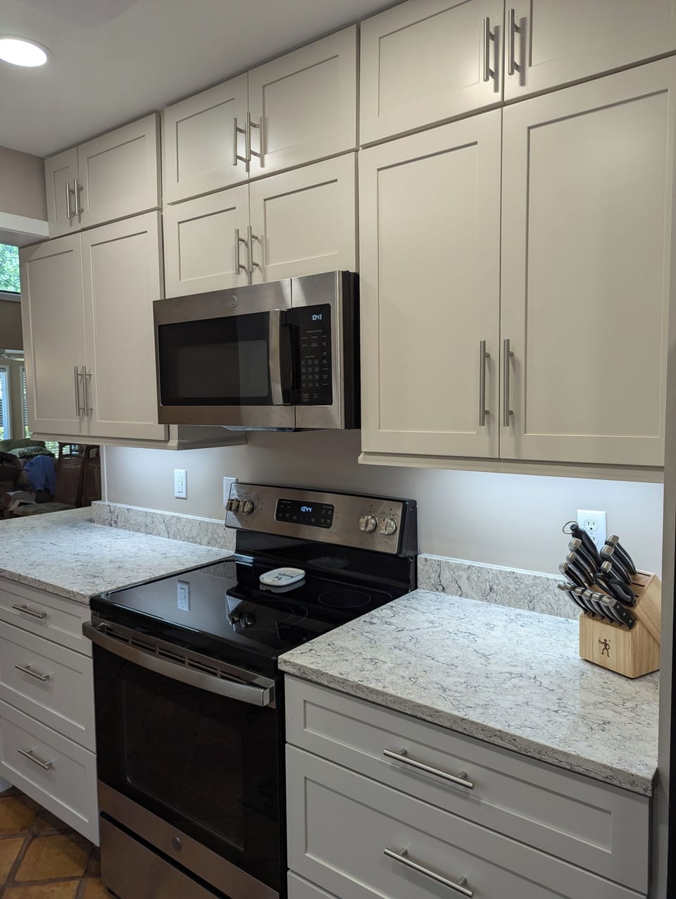 Galley kitchen - fully stocked with small appliances and utensils