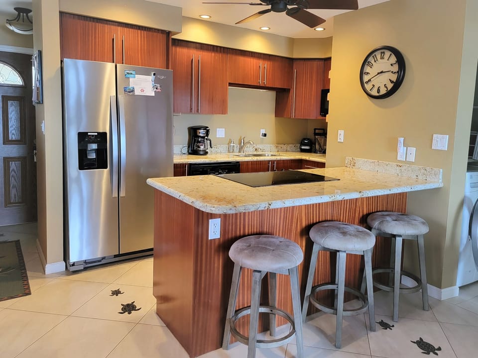 Updated kitchen with bar seating for 3.  