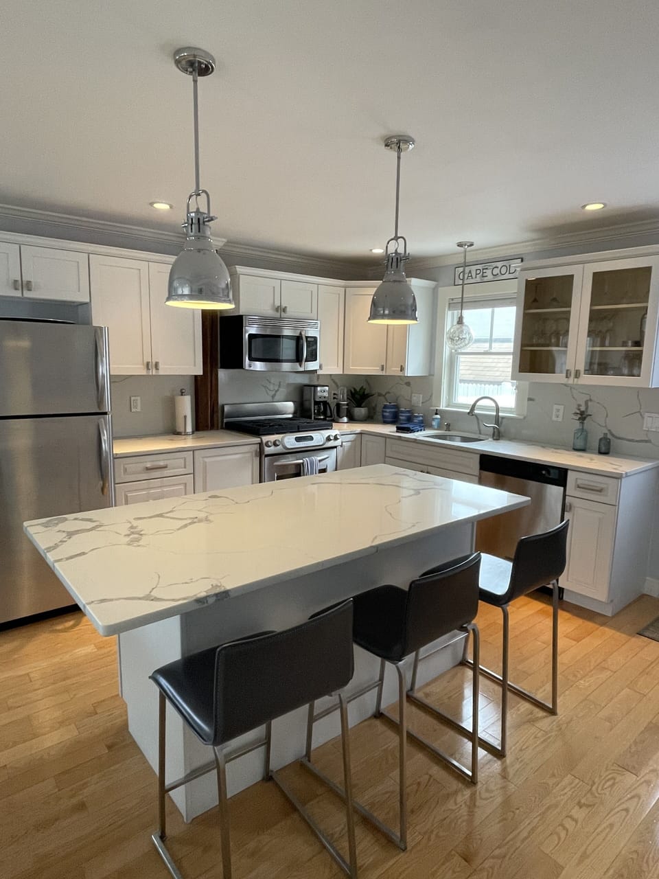 Kitchen - Island seats 3. Tons of space for cooking. 