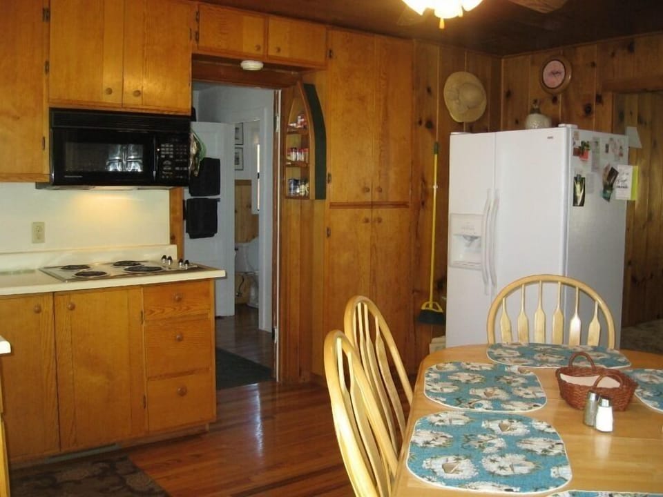 Plenty of spices & cooking ingredients in cupboards.  Convection/microwave oven