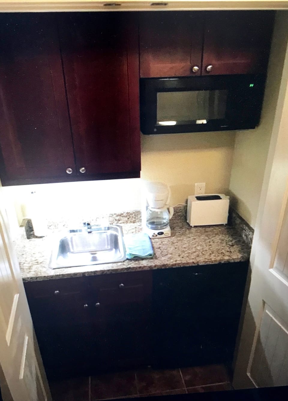 Kitchenette in guest suite has small fridge, microwave, coffeemaker, etc.