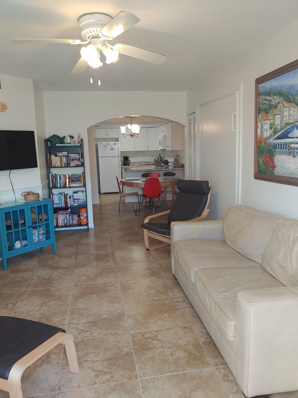 View of living room, dining room and kitchen.