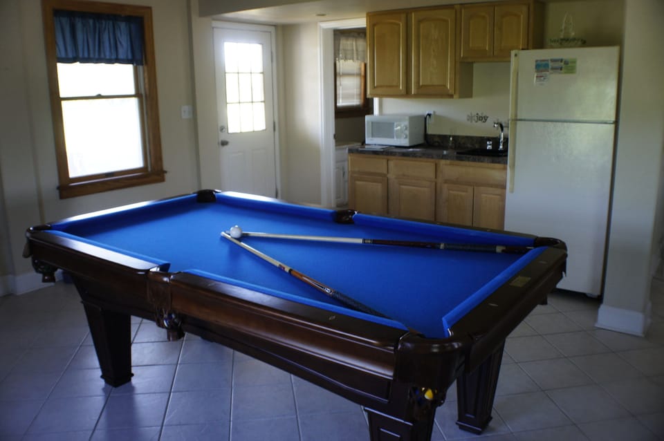 New pool table in 2012 with wetbar, fridge, microwave in game/TV room.
