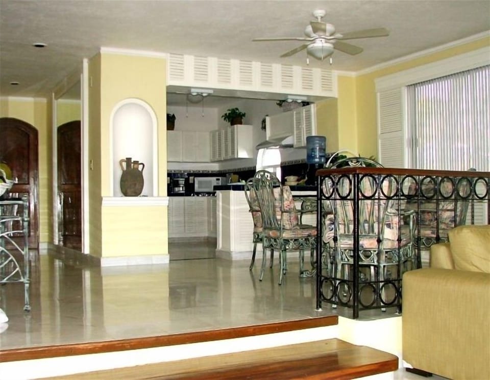 Main floor of villa with kitchen and dining area