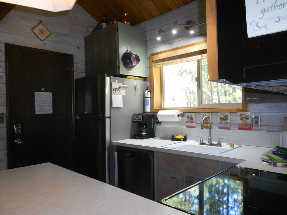 Bright kitchen has thoughtful decor with all the essentials and then some.