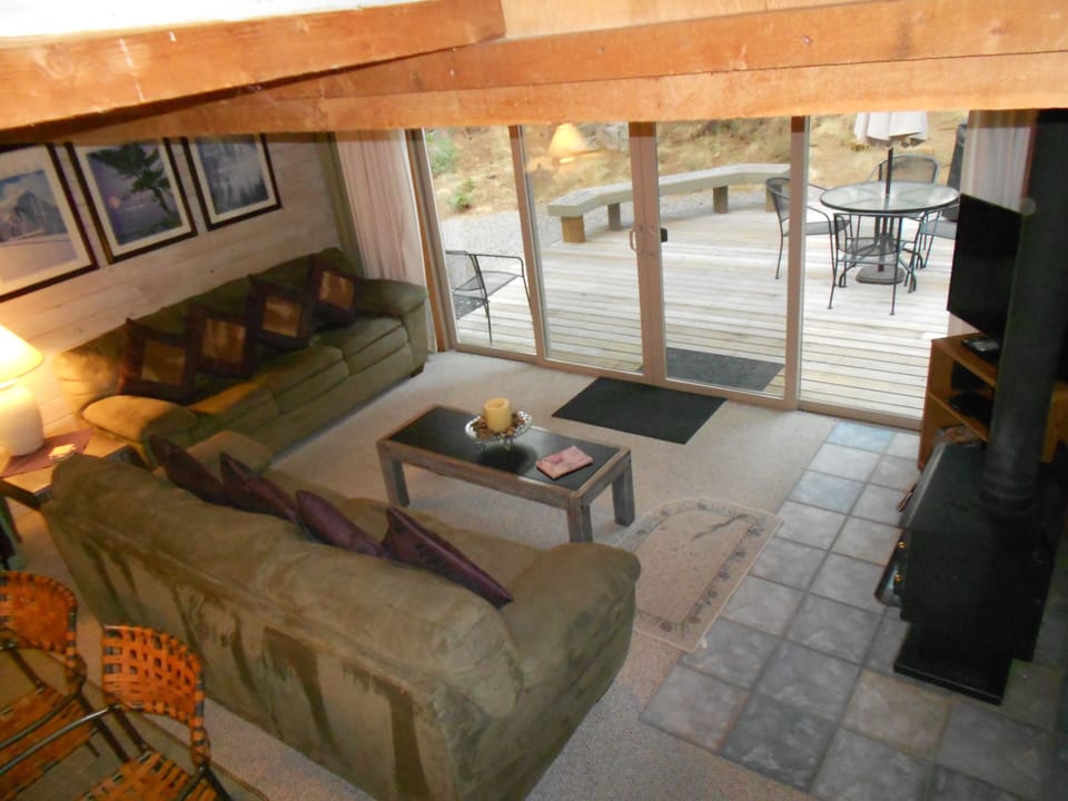 Living Room and deck view from staircase.