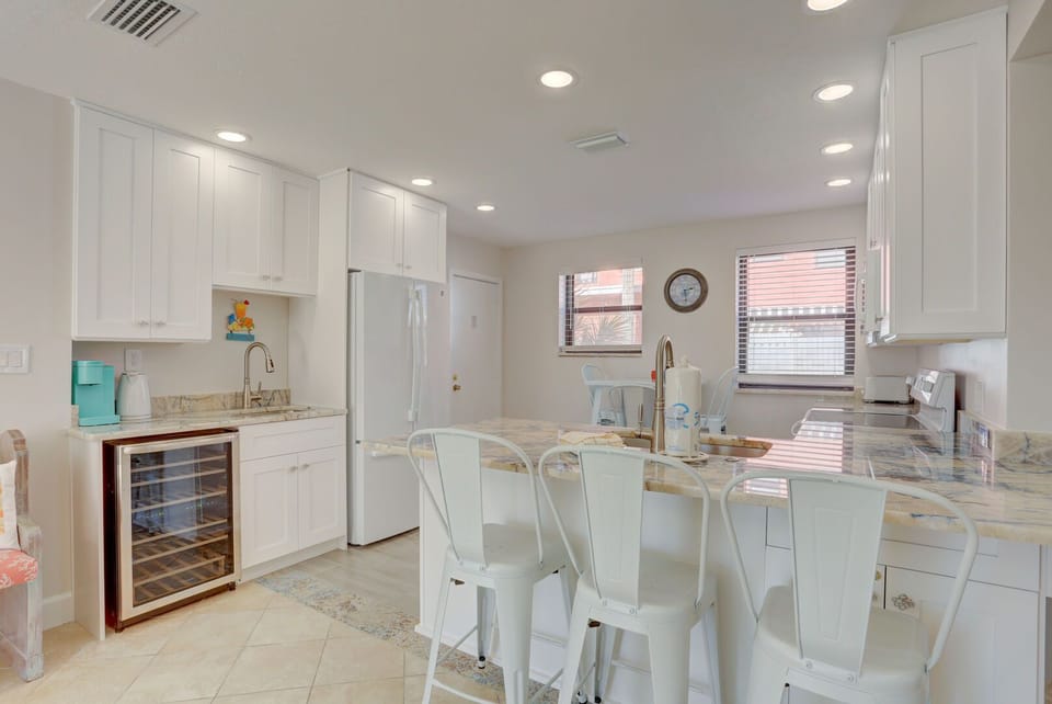 Newly renovated with all new appliances, flooring, cabinetry and quartzite!