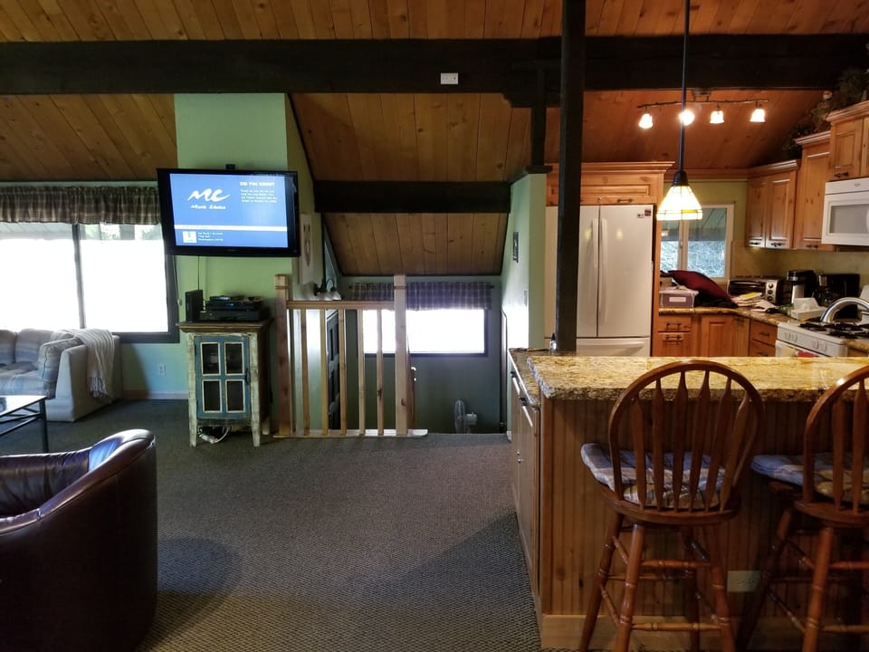 Great room, showing kitchen and midlevel Entry w/eastern morning exposure. 